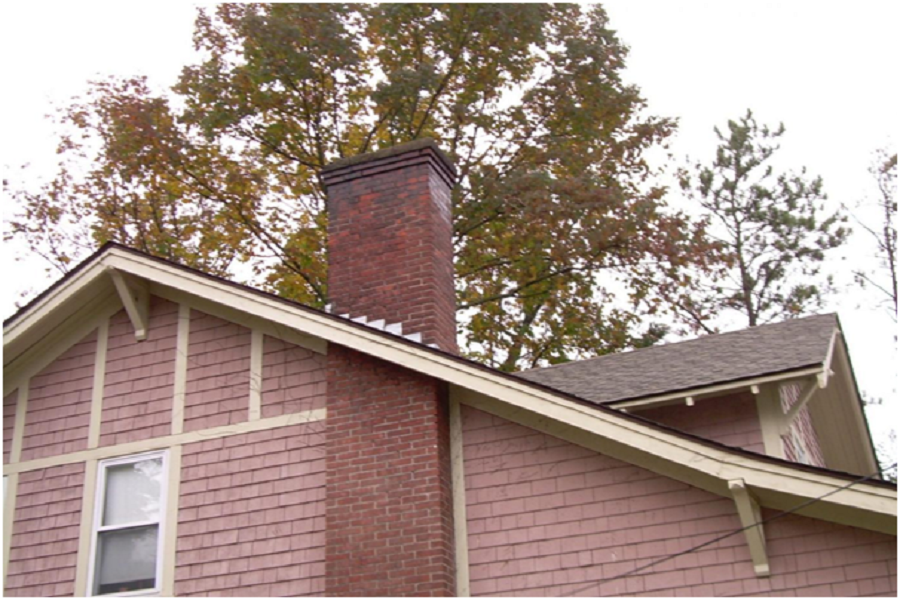 Brick chimney in a house. 