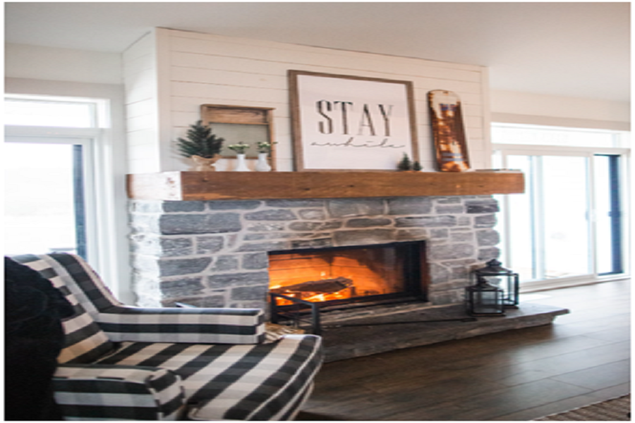 Stone fireplace in modern house.